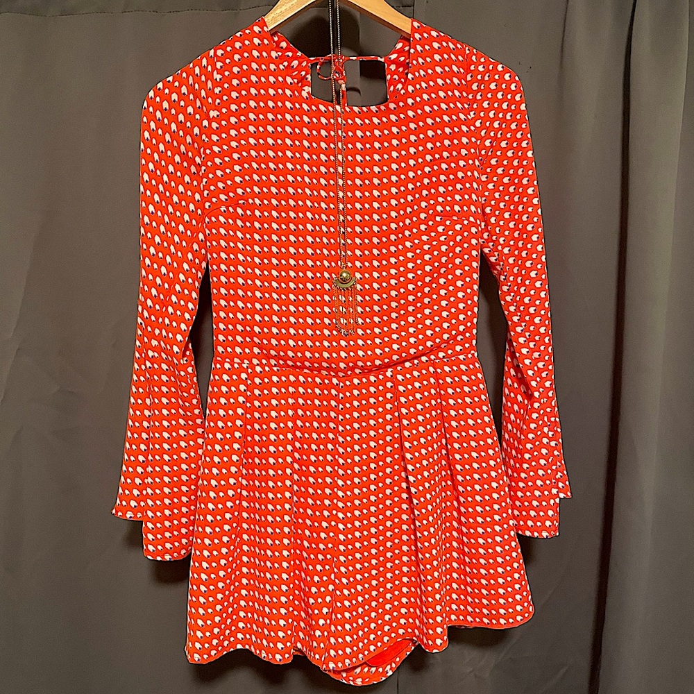 Beautiful lined Romper ties around neck and back never worn